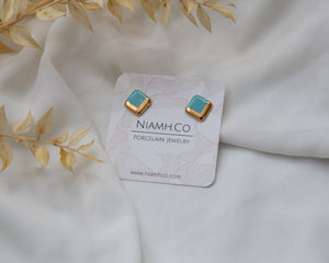 Gold and Porcelain Turquoise Square Studs