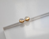 Gold and Porcelain Black Speckled Mini Circle Studs.