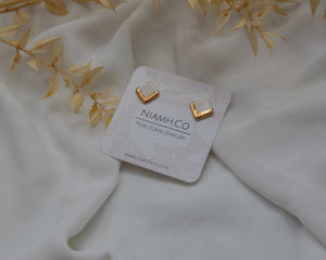 Gold and Porcelain White Square Studs